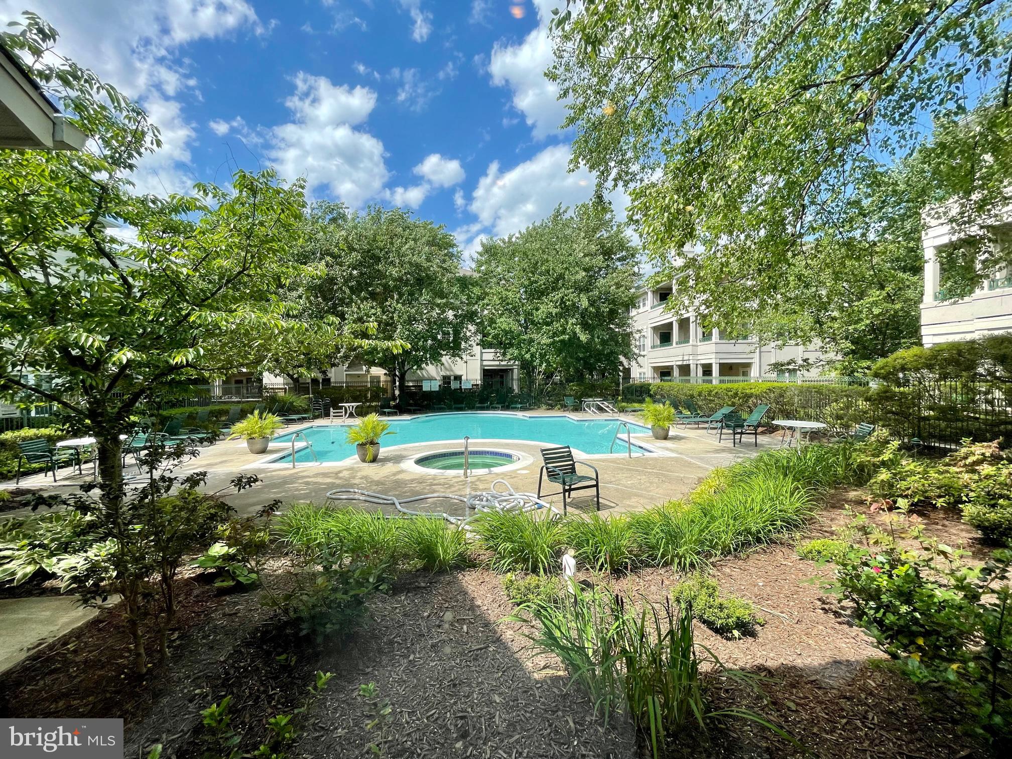 12009 Taliesin Place, Unit 31 Reston, VA 20190 - Photo 18 of 19 a view of a park with large trees