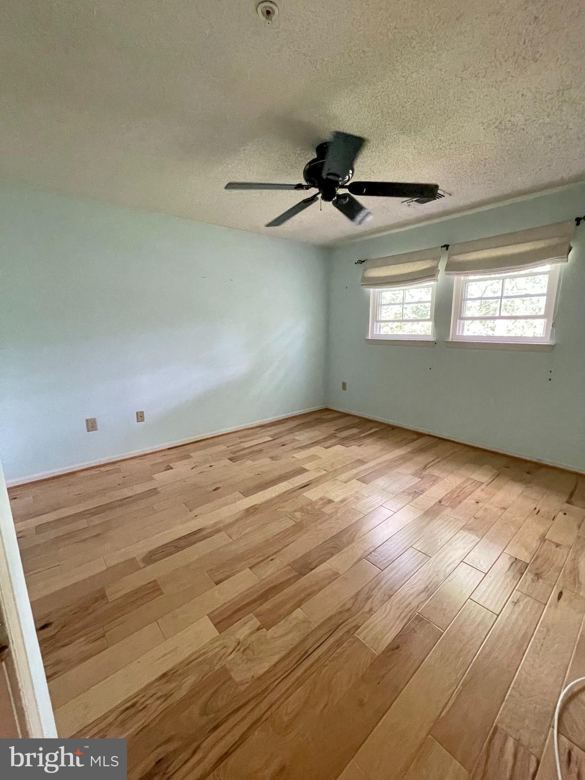 12009 Taliesin Place, Unit 31 Reston, VA 20190 - Photo 8 of 19 a view of an empty room with a window