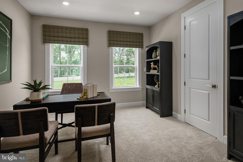 9434 Founders Lane Perry Hall, MD 21128 - Photo 11 of 18 a view of a workspace with a window and dining table