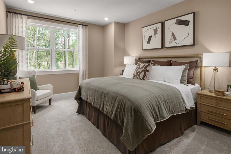 9434 Founders Lane Perry Hall, MD 21128 - Photo 14 of 18 a bedroom with a large bed and furniture