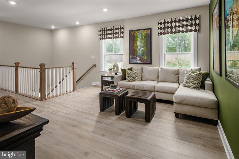 9434 Founders Lane Perry Hall, MD 21128 - Photo 10 of 18 a living room with furniture and a large window