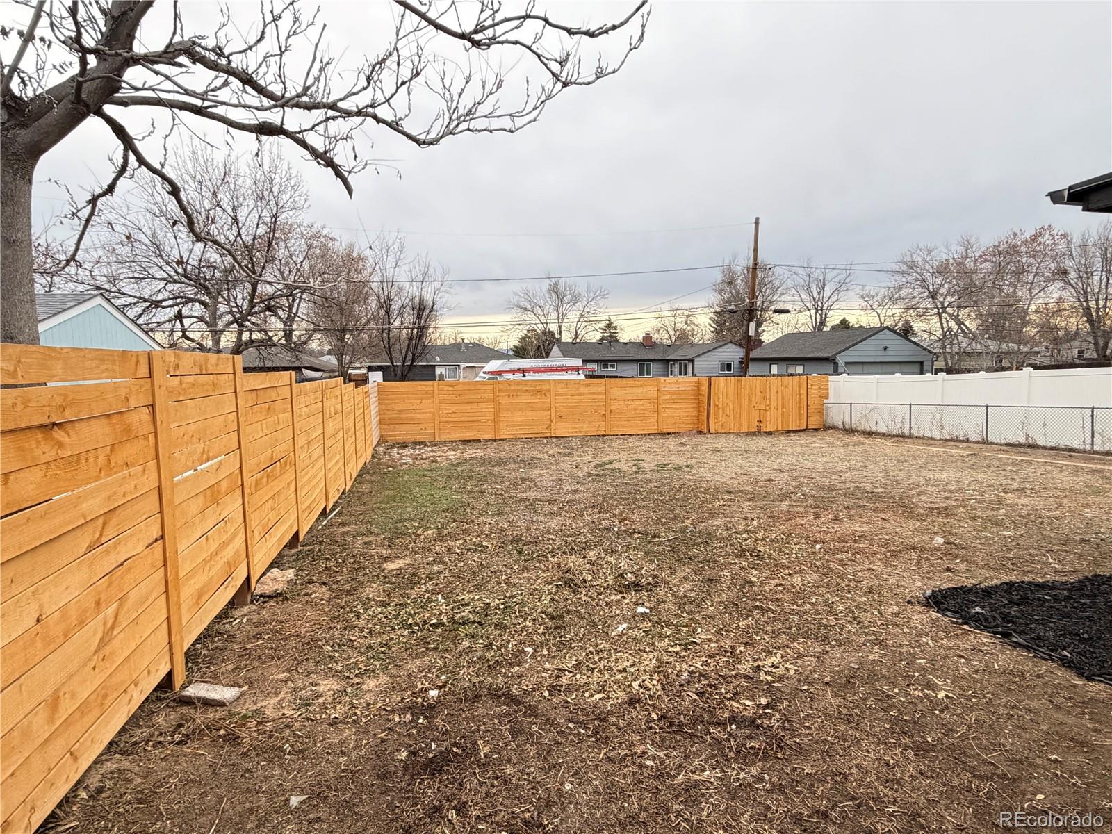 1173 Ironton Street Aurora, CO 80010 - Photo 25 of 28 a view of an ocean with a trees