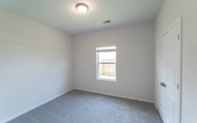 an empty room with a window