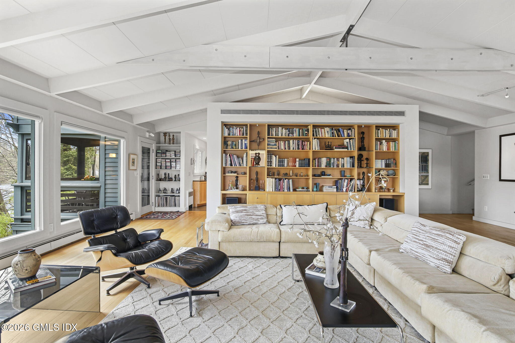 185 Valley Road Cos Cob, CT 06807 - Photo 8 of 38 a living room with furniture and floor to ceiling windows