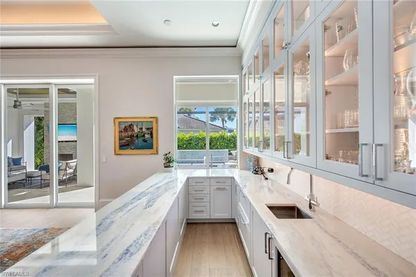 a bathroom with a large window and a bath tub