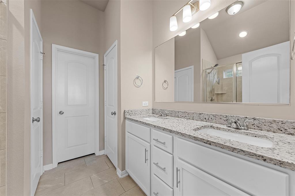 313 Branch Road Woodway, TX 76712 - Photo 12 of 16 a bathroom with a granite countertop sink and a mirror