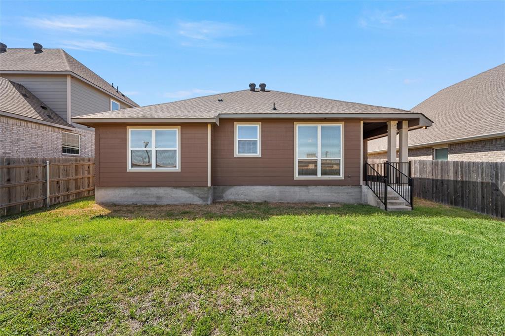 313 Branch Road Woodway, TX 76712 - Photo 15 of 16 a front view of a house with a yard