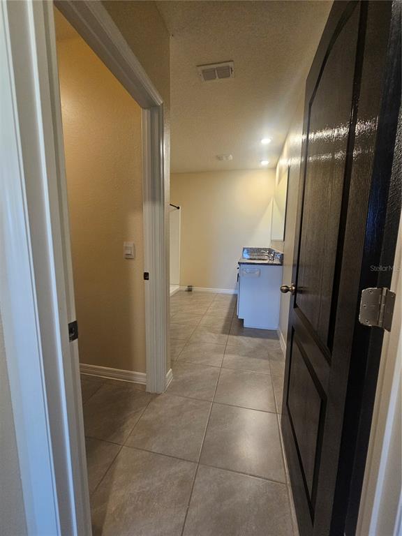 2853 Grandbury Grove Road Lakeland, FL 33811 - Photo 17 of 25 a bathroom with a glass door shower and a sink