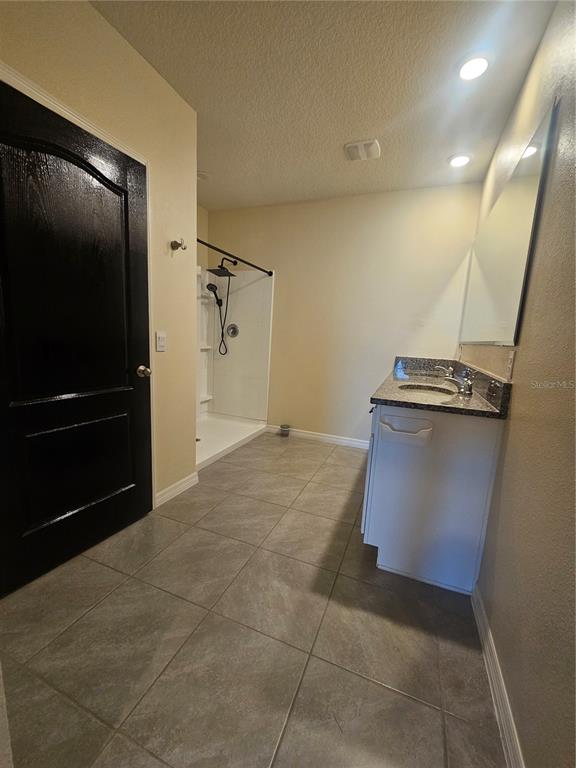 2853 Grandbury Grove Road Lakeland, FL 33811 - Photo 19 of 25 a view of a refrigerator in kitchen and a sink