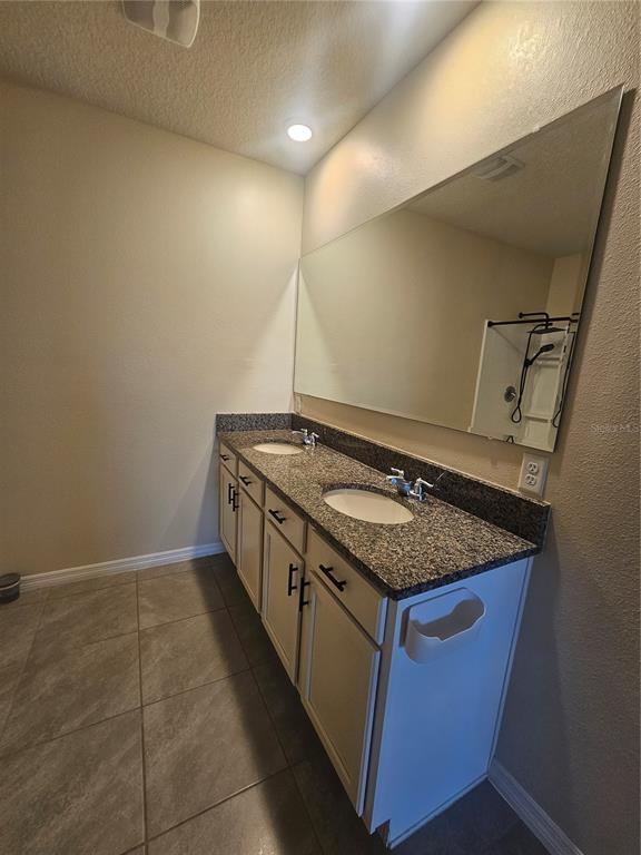 2853 Grandbury Grove Road Lakeland, FL 33811 - Photo 20 of 25 a kitchen with a stove and a sink