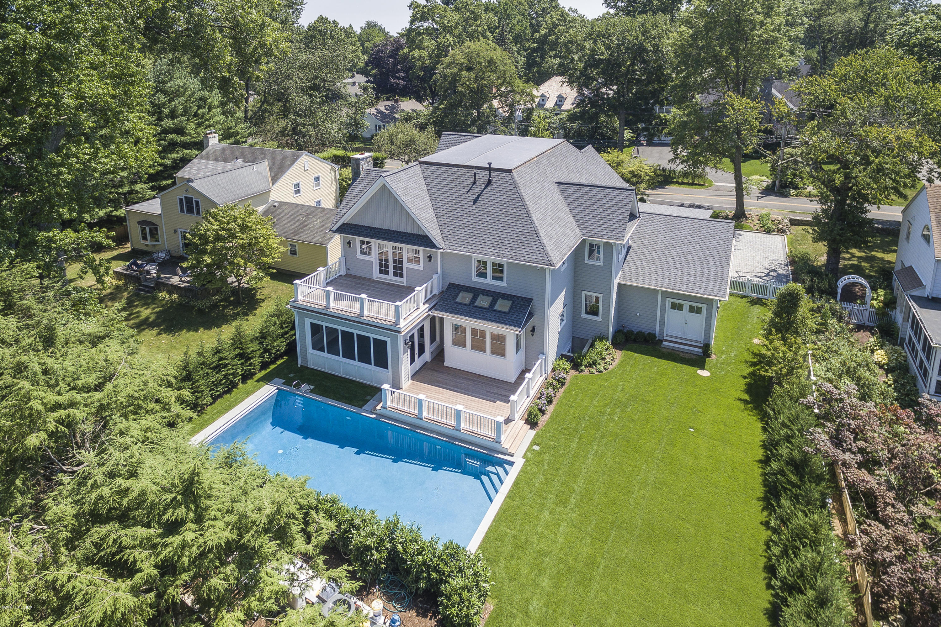 121 Lockwood Road Riverside, CT 06878 - Photo 3 of 40 an aerial view of a house with a big yard