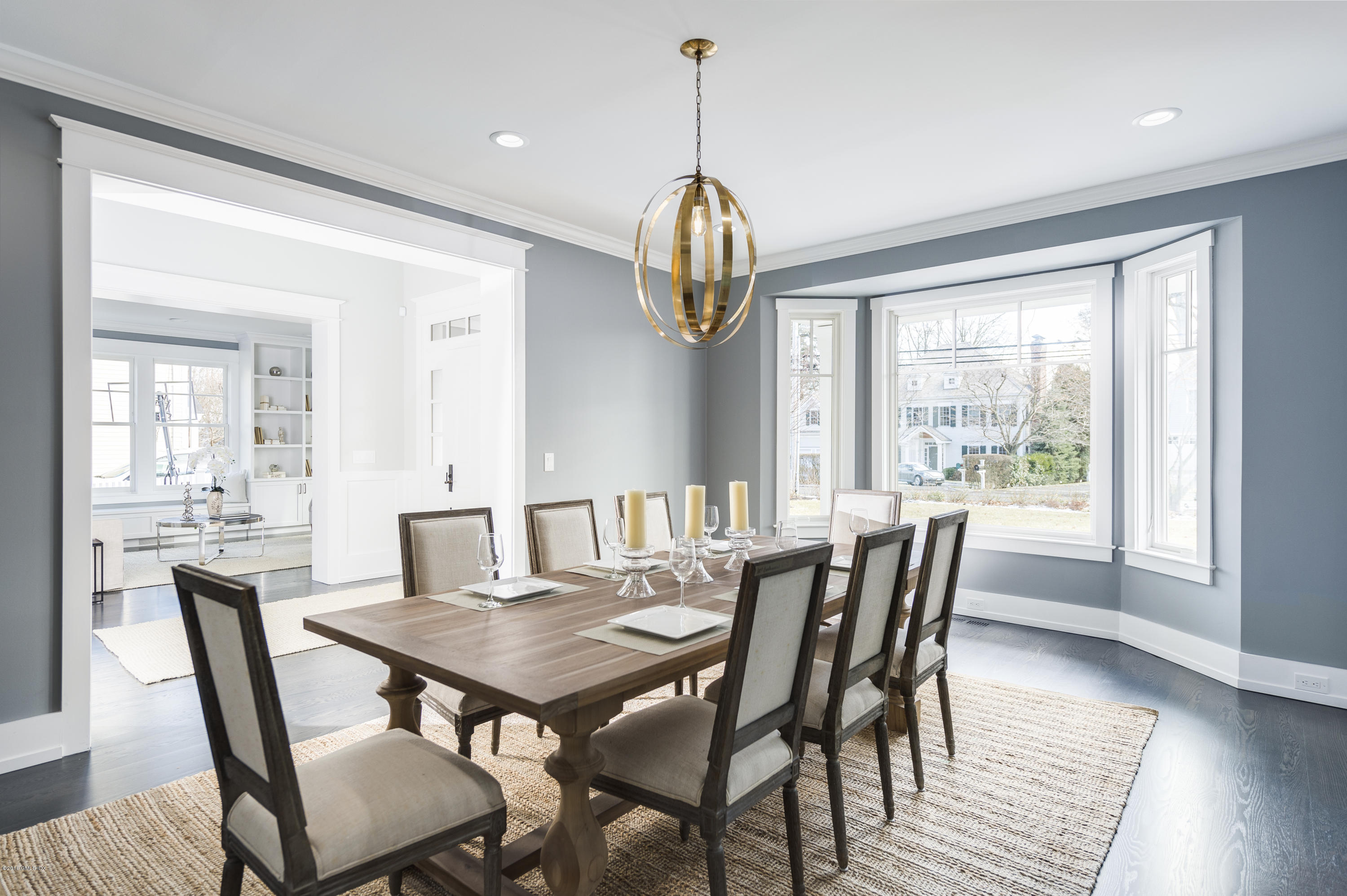 121 Lockwood Road Riverside, CT 06878 - Photo 8 of 40 a view of a dining room with furniture window and wooden floor