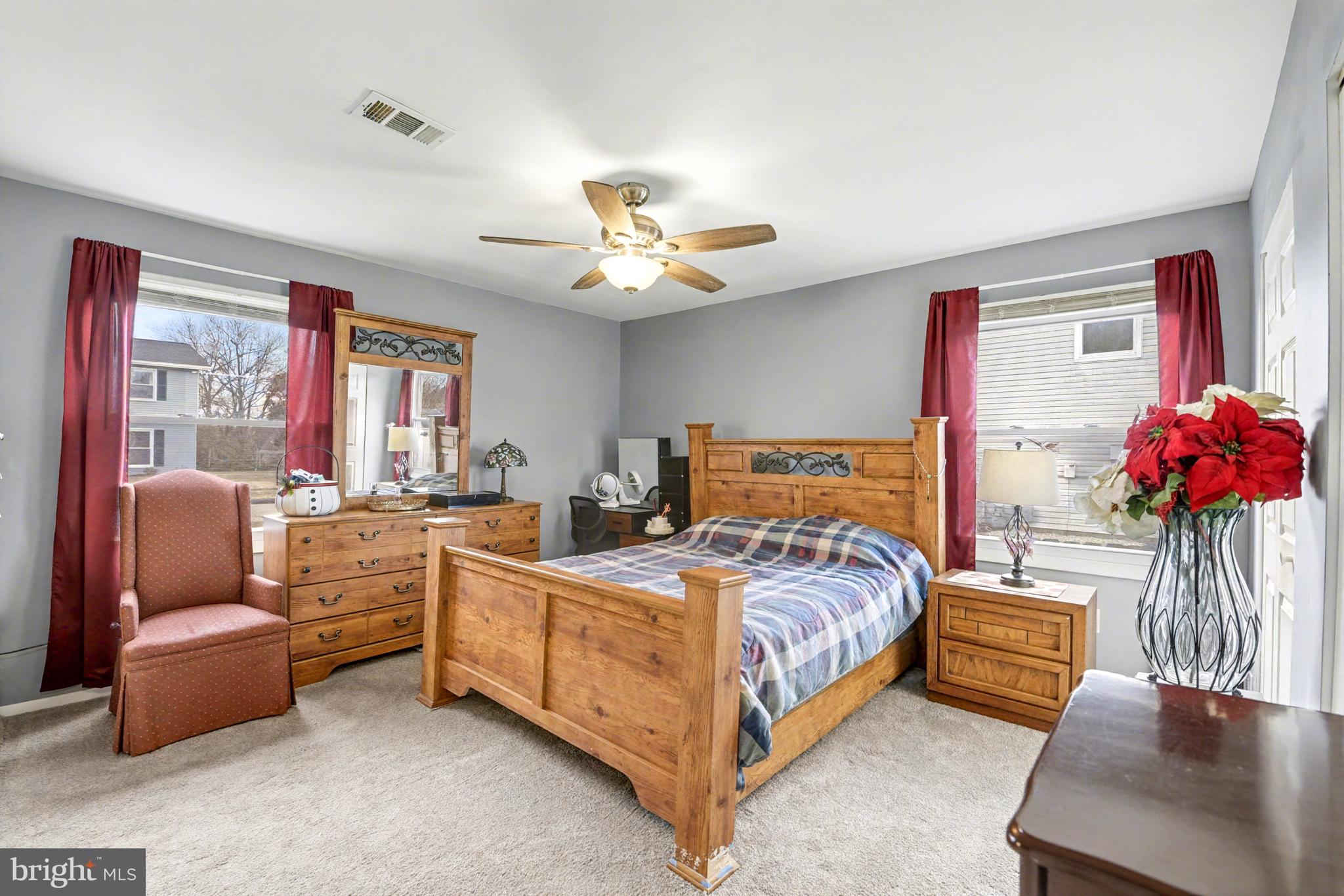 1804 Harbinger Trail Edgewood, MD 21040 - Photo 14 of 29 a bedroom with a bed couch and window