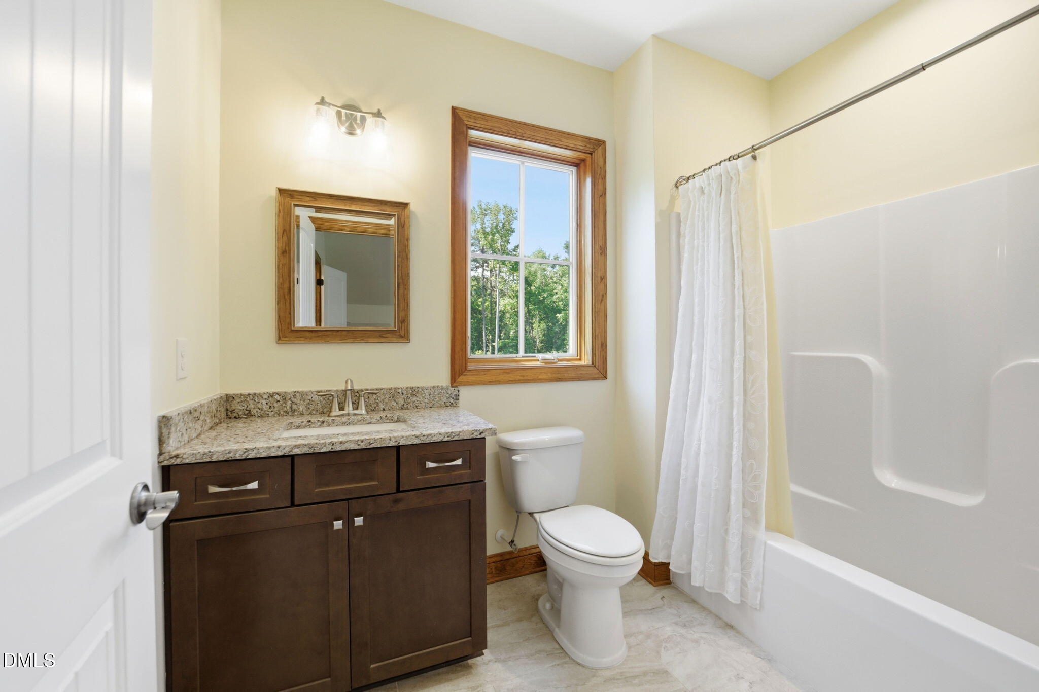 35 North Rippling Court Smithfield, NC 27577 - Photo 43 of 59 a bathroom with a granite countertop sink toilet and shower