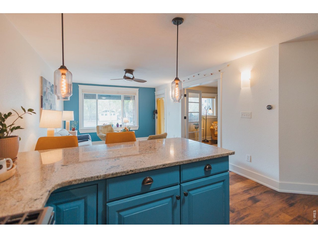 233 North Meldrum Street Fort Collins, CO 80521 - Photo 12 of 46 a view of kitchen with cabinets and wooden floor