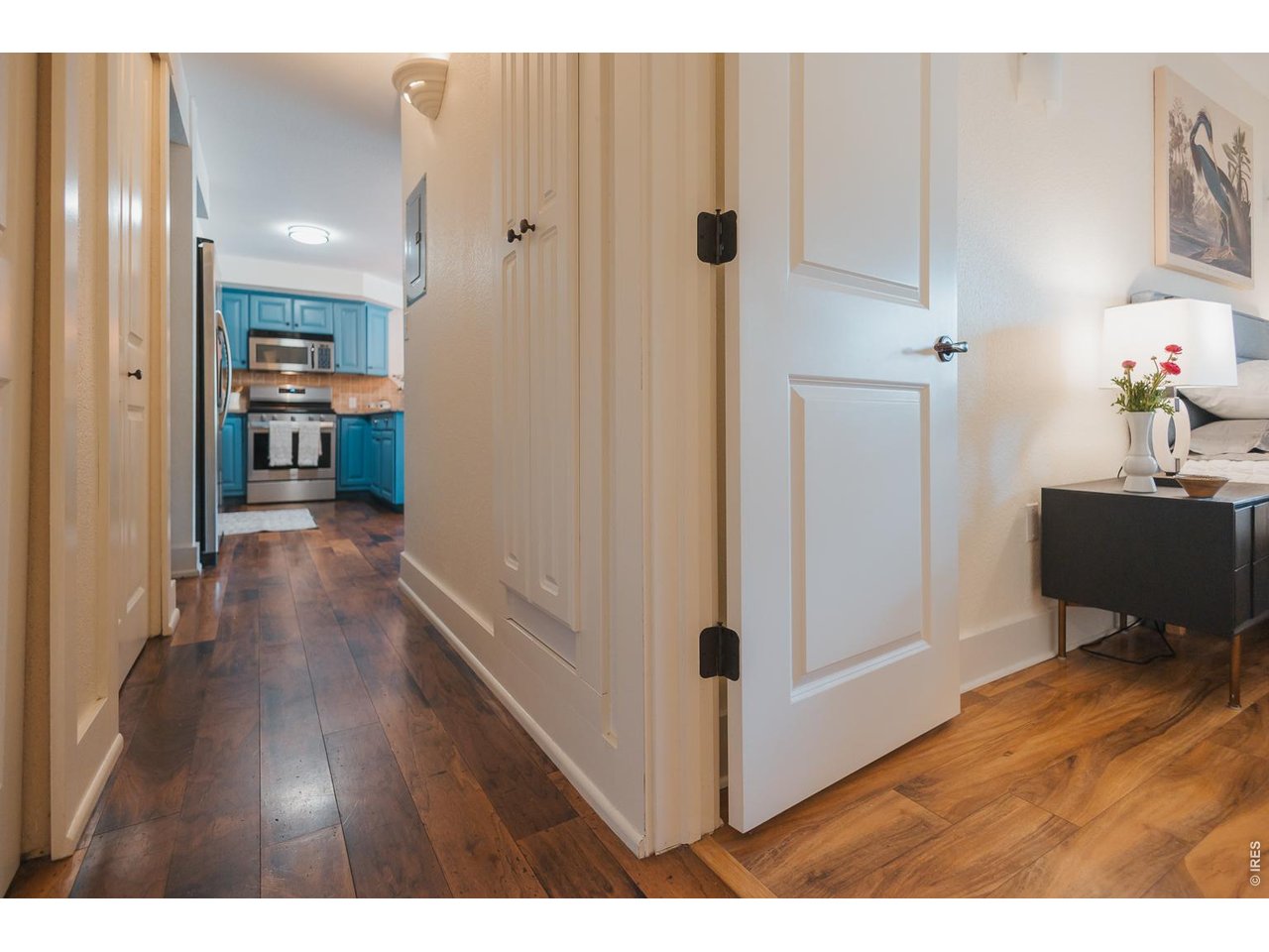 233 North Meldrum Street Fort Collins, CO 80521 - Photo 19 of 46 a view of a hallway view with wooden floor and furniture