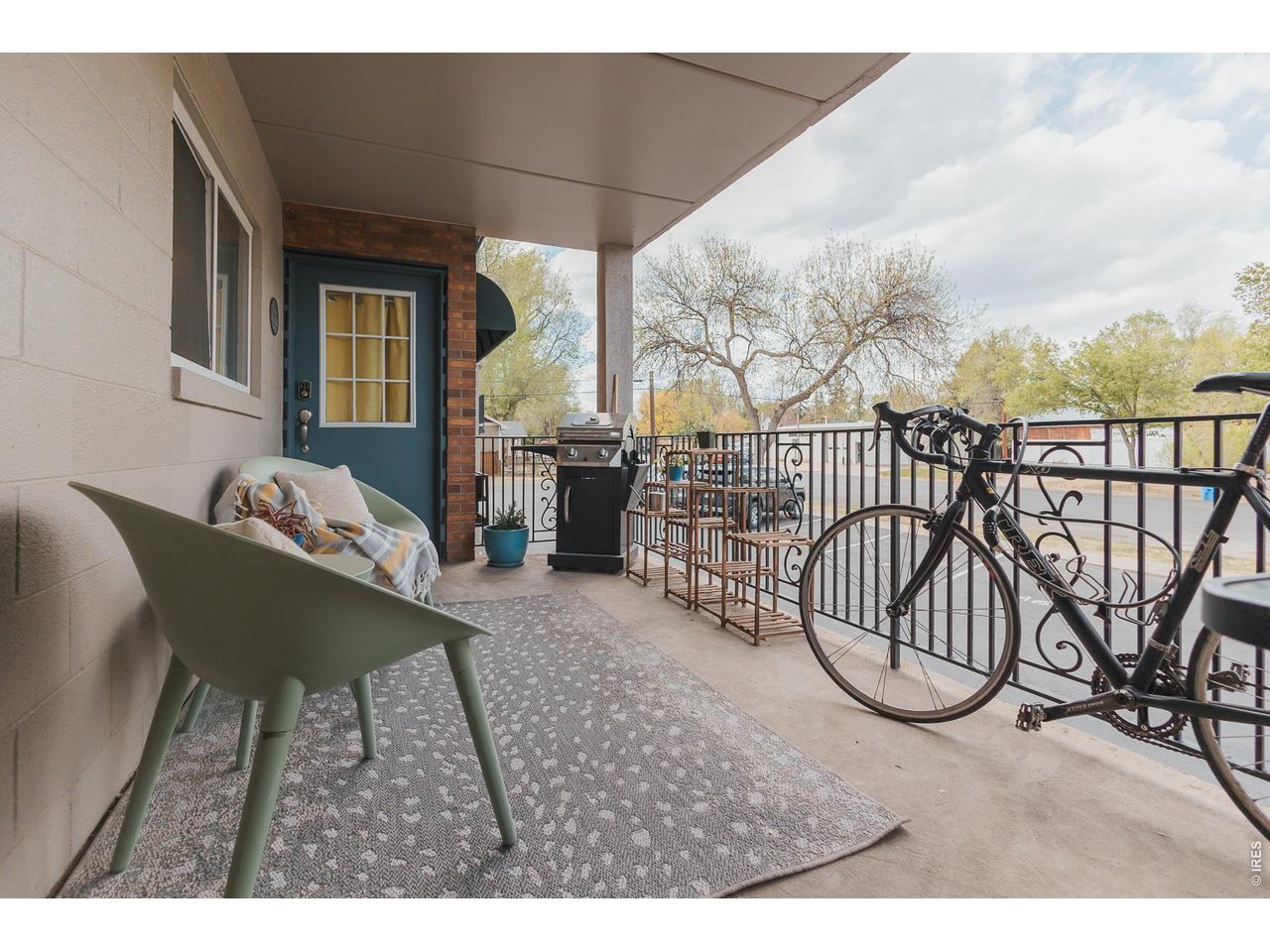 233 North Meldrum Street Fort Collins, CO 80521 - Photo 3 of 46 a view of a patio with a table and chairs