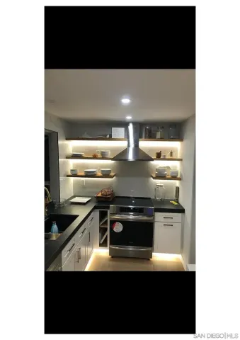 a kitchen with a stove and a microwave