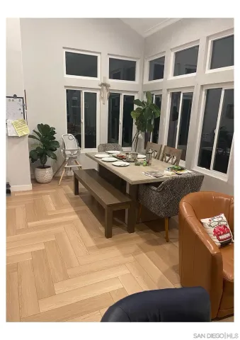 a view of a living room and kitchen