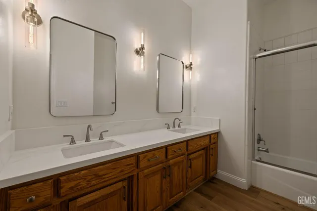 a bed room with a bed and a large window