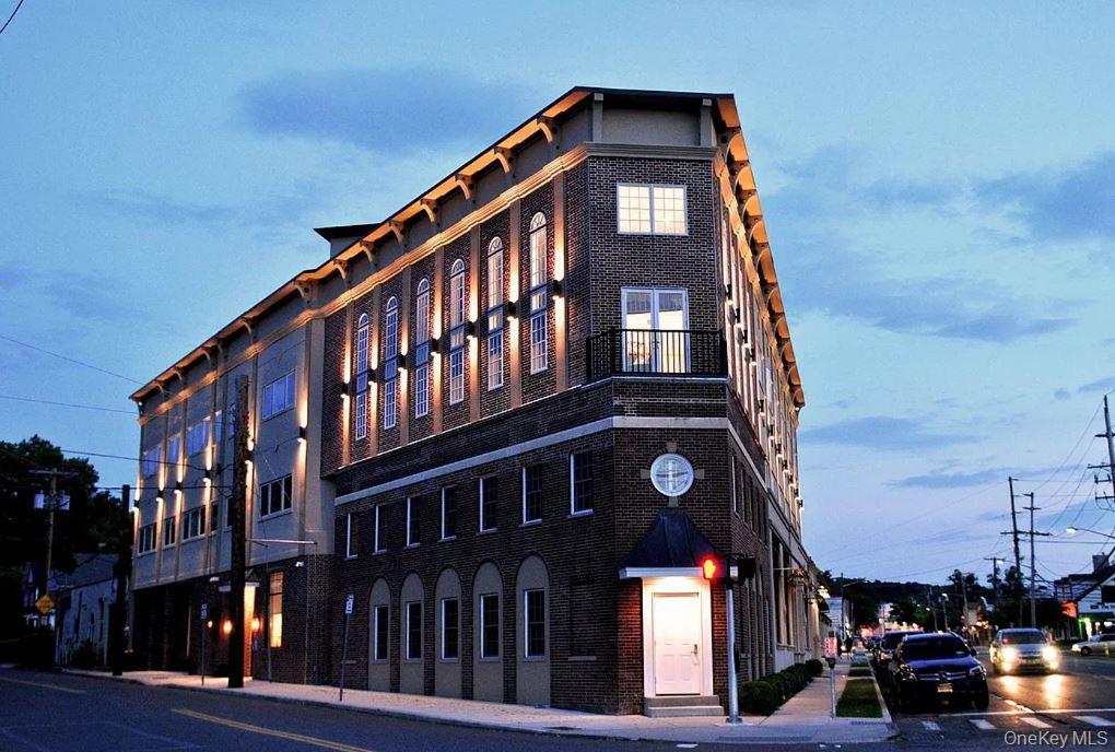 226 New York Avenue, Unit 302 Huntington, NY 11743 - Photo 1 of 11 a front view of a building