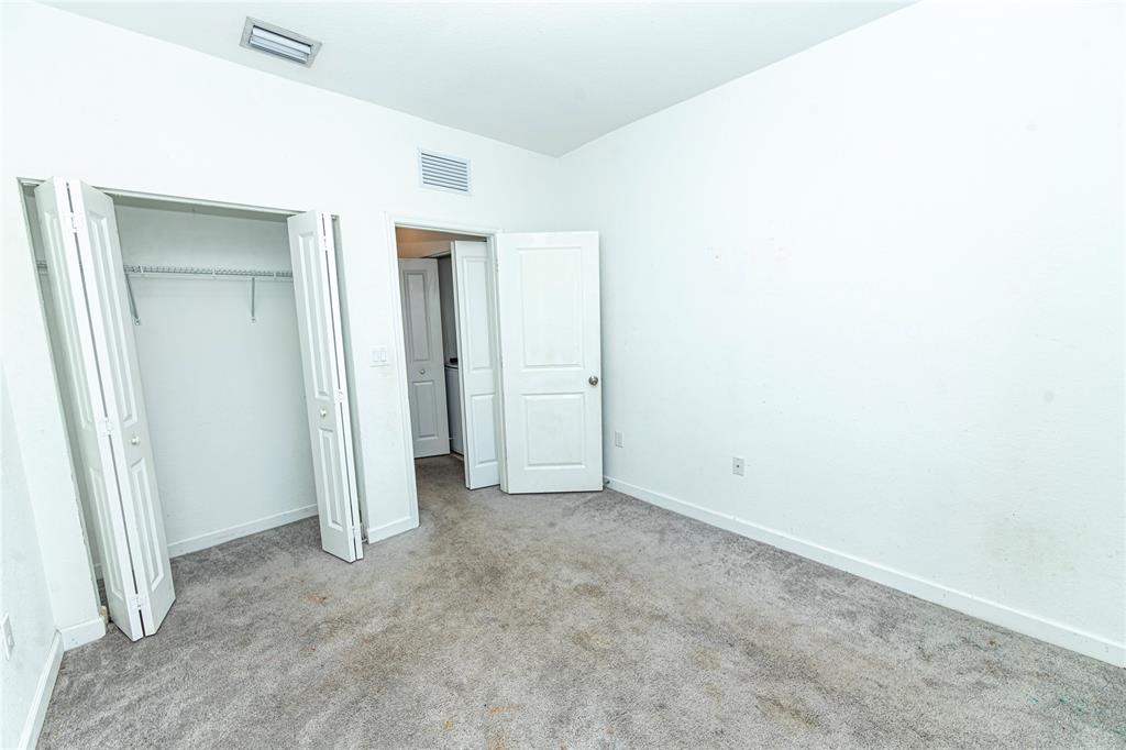 20920 Northeast 8th Avenue Miami, FL 33162 - Photo 12 of 19 an empty room with closet