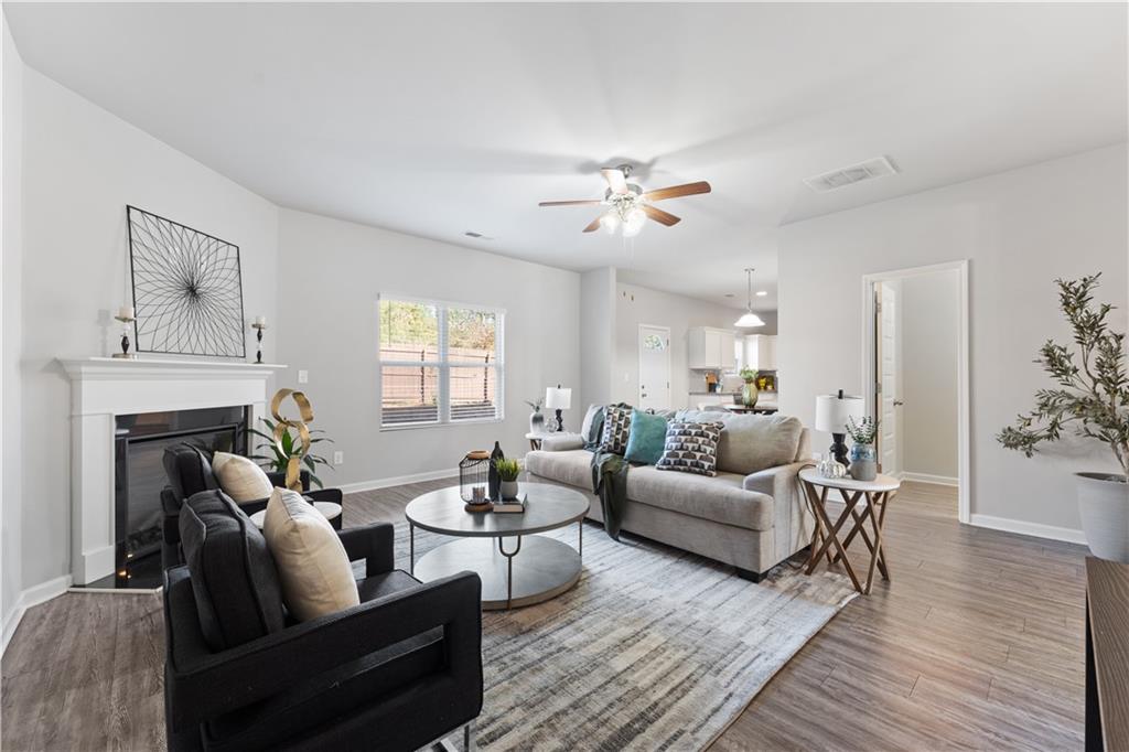 3178 Cedar Crest Way Decatur, GA 30034 - Photo 1 of 1 a living room with furniture and a fireplace