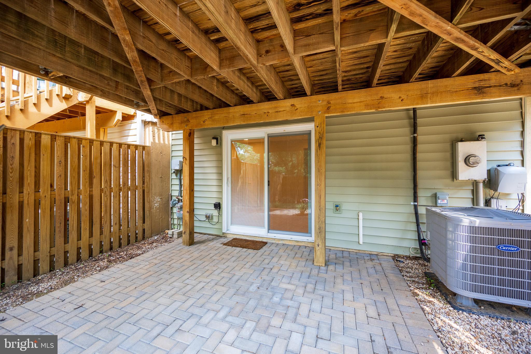 7468 Lone Star Road Lorton, VA 22079 - Photo 40 of 44 Brick patio underneath deck