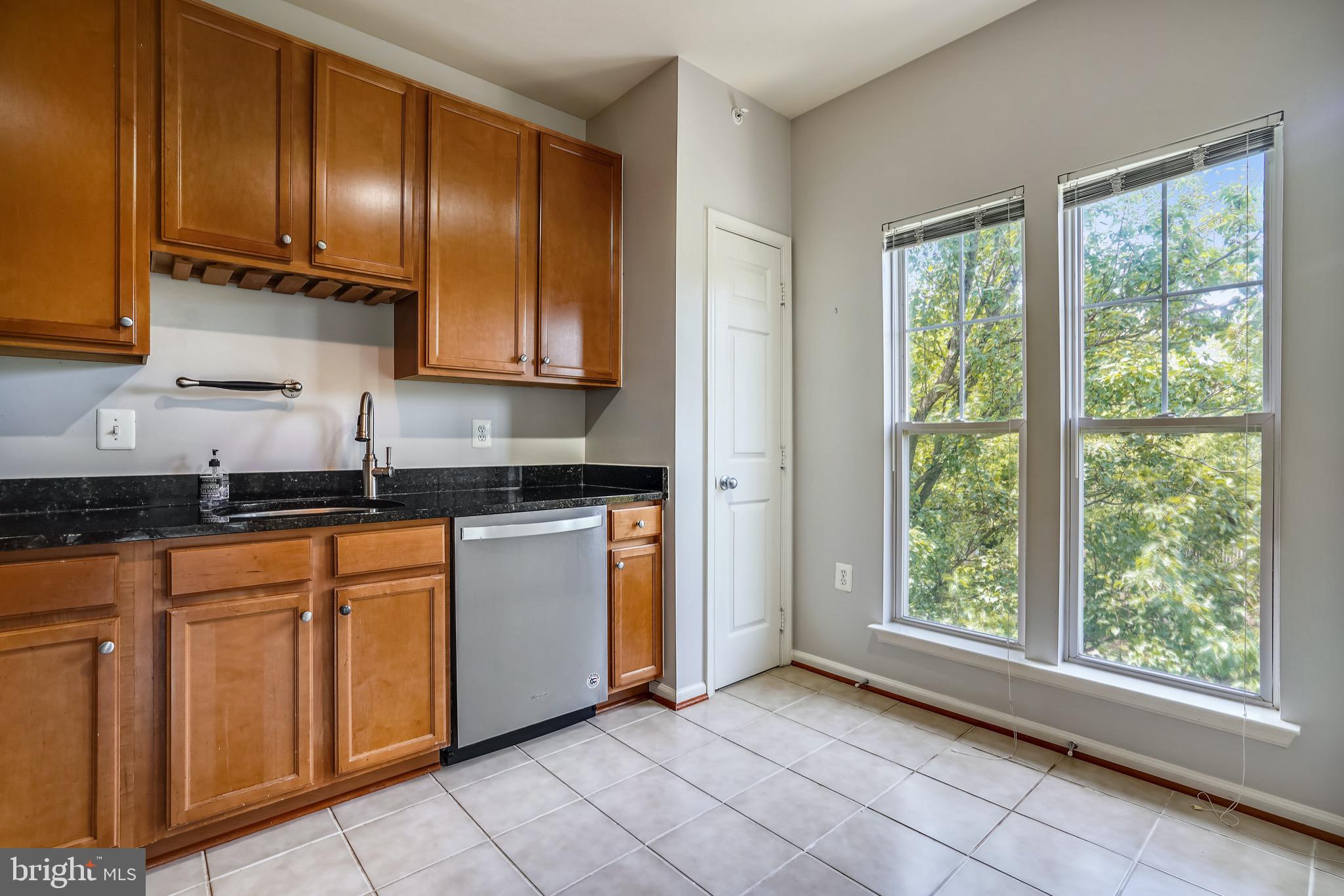 1515 North Point Drive, Unit 301 Reston, VA 20194 - Photo 11 of 32 large kitchen with room for table