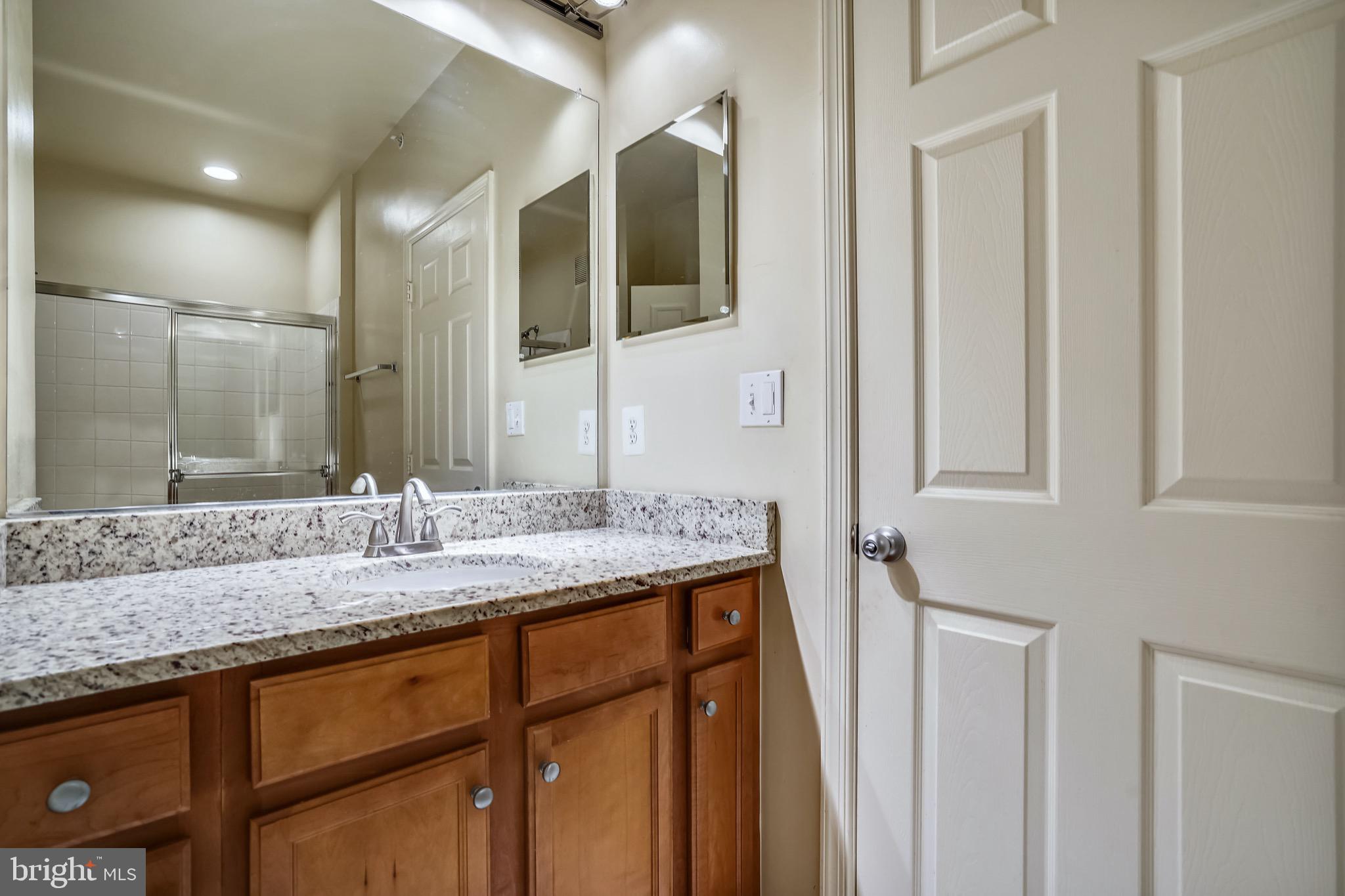1515 North Point Drive, Unit 301 Reston, VA 20194 - Photo 20 of 32 large 2nd bath located off bedroom