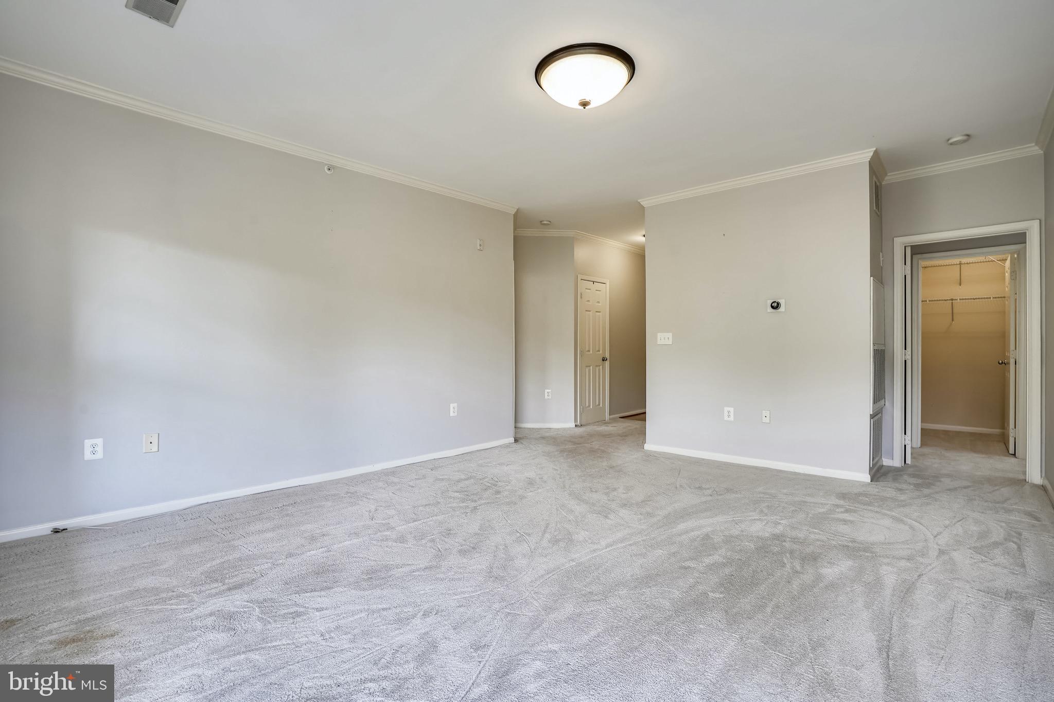 1515 North Point Drive, Unit 301 Reston, VA 20194 - Photo 23 of 32 2nd bedroom access off living area