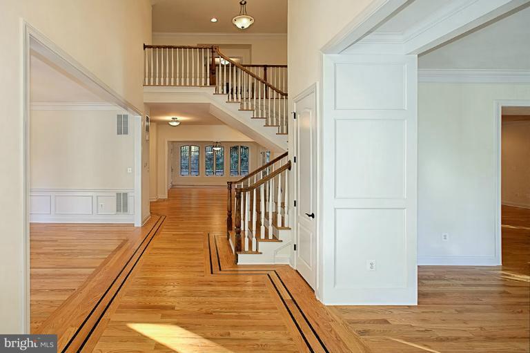 6010 Chesterbrook Road McLean, VA 22101 - Photo 3 of 30 a view of entryway and hall with wooden floor