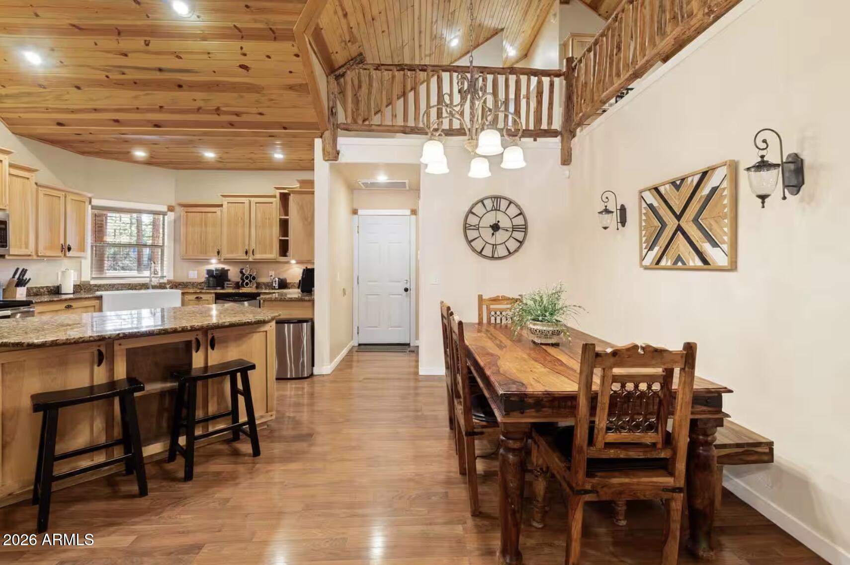 2540 Timber Ridge Lane Pinetop, AZ 85935 - Photo 11 of 37 a view of a dining area with furniture and a kitchen