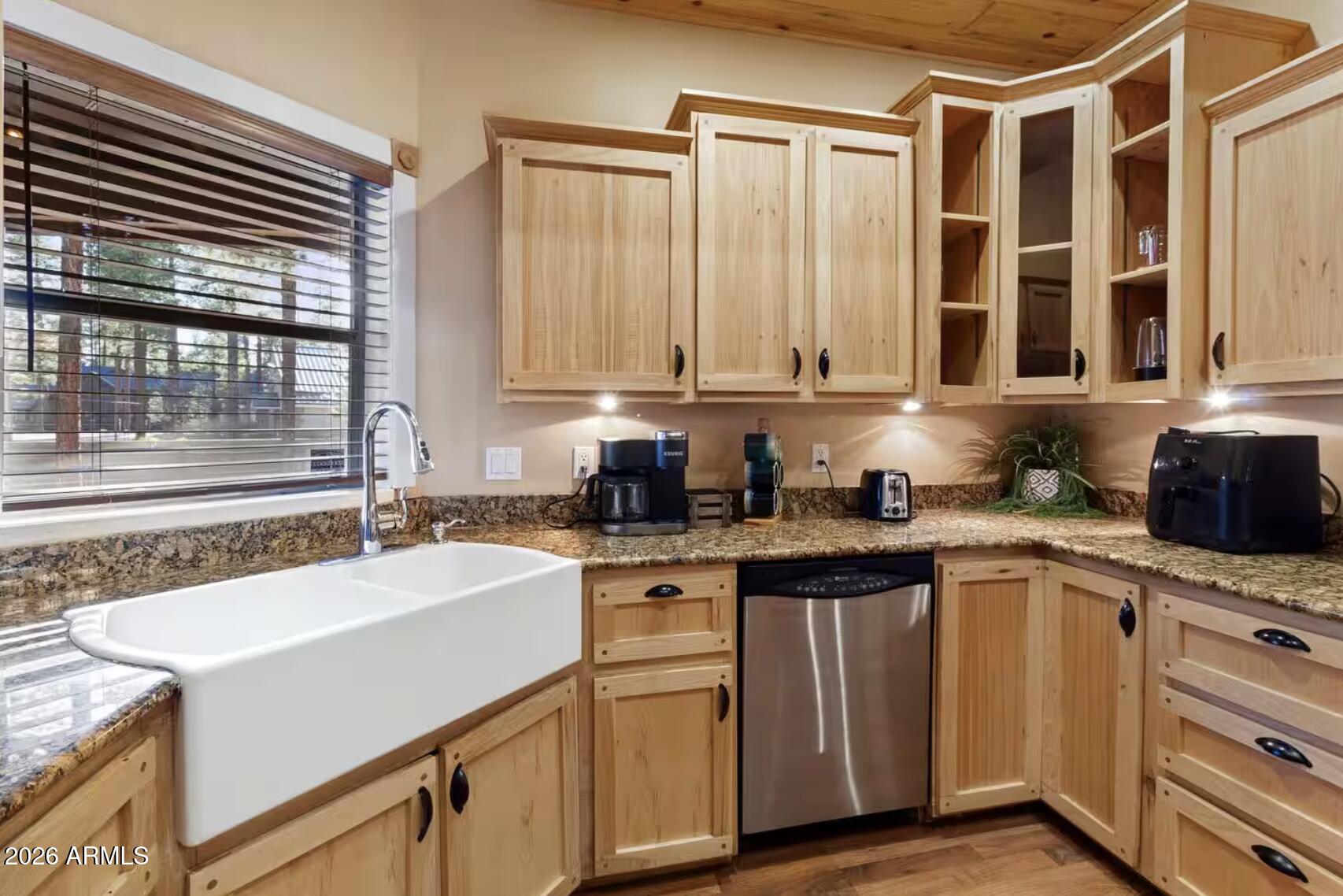 2540 Timber Ridge Lane Pinetop, AZ 85935 - Photo 14 of 37 a kitchen with a sink stove and cabinets