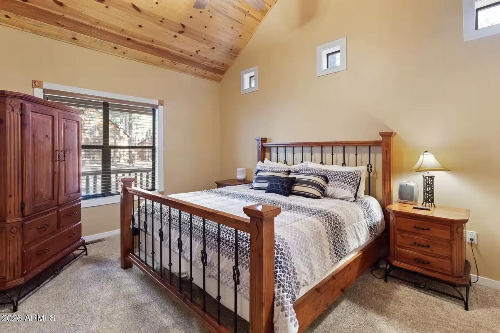 2540 Timber Ridge Lane Pinetop, AZ 85935 - Photo 16 of 37 a bedroom with a bed and a window