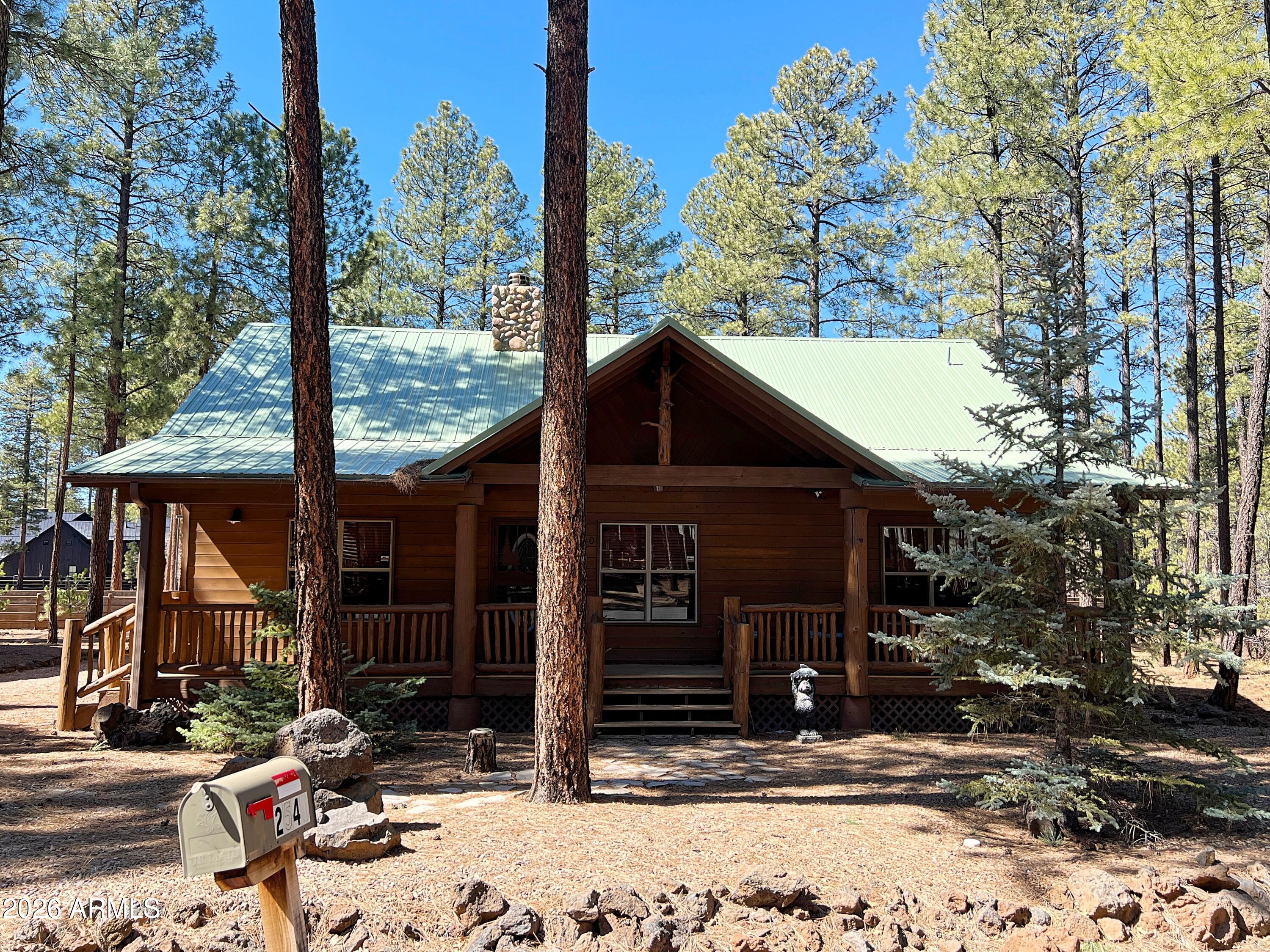 2540 Timber Ridge Lane Pinetop, AZ 85935 - Photo 2 of 37 a front view of a house