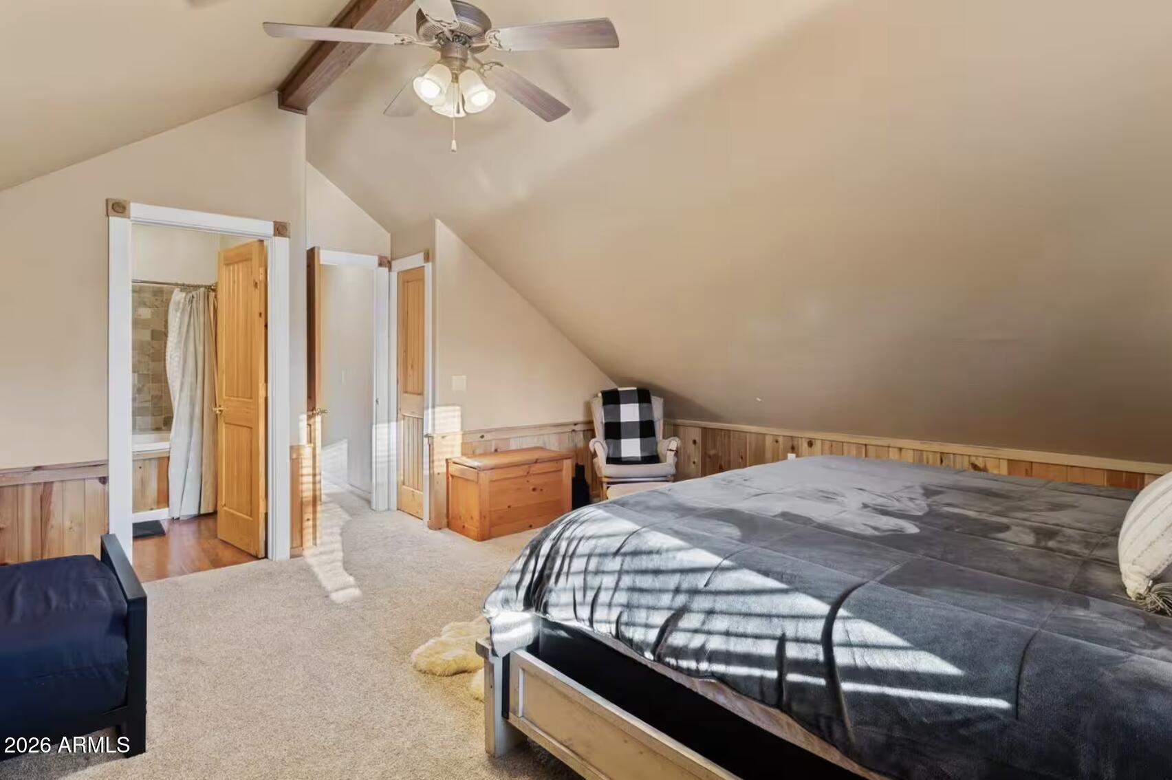 2540 Timber Ridge Lane Pinetop, AZ 85935 - Photo 33 of 37 a bedroom with a bed and ceiling fan