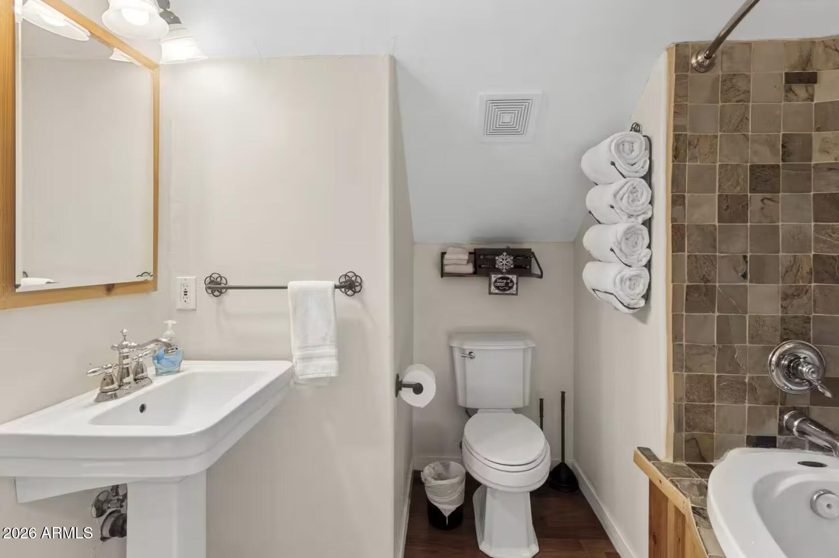 2540 Timber Ridge Lane Pinetop, AZ 85935 - Photo 35 of 37 a bathroom with a sink toilet and shower