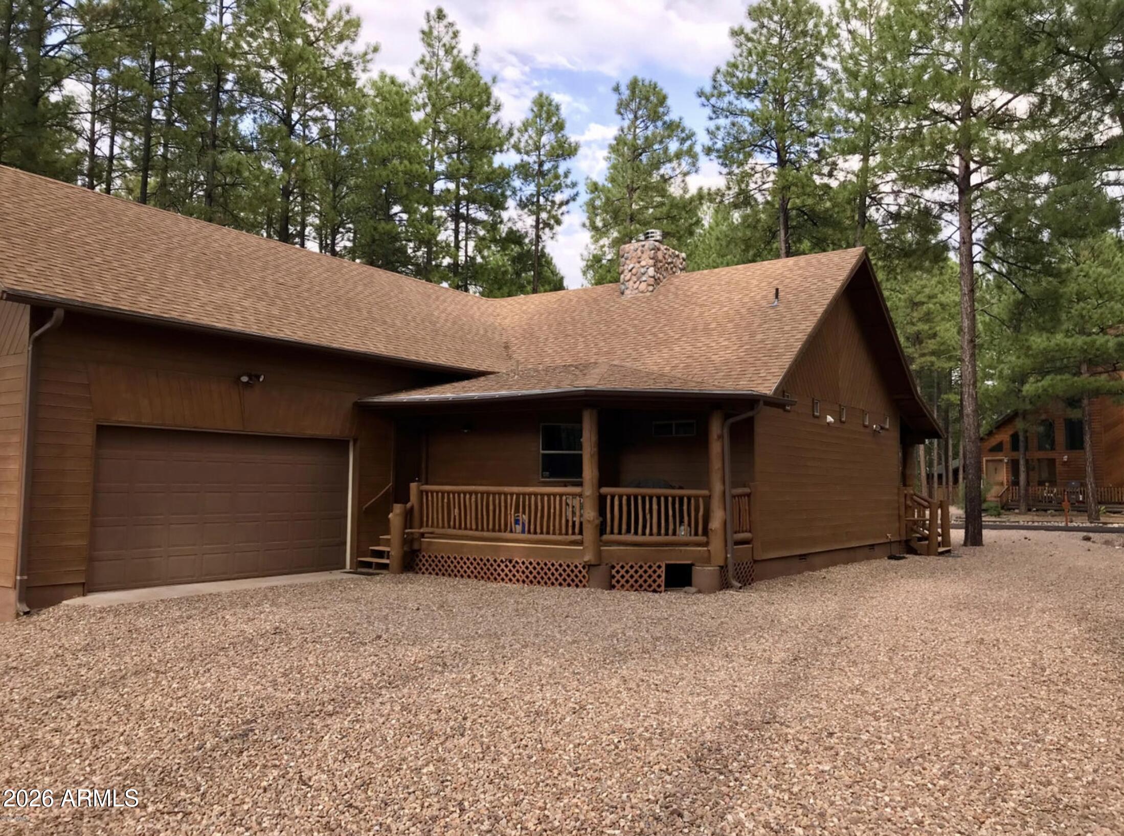 2540 Timber Ridge Lane Pinetop, AZ 85935 - Photo 37 of 37 a view of a house with a garage