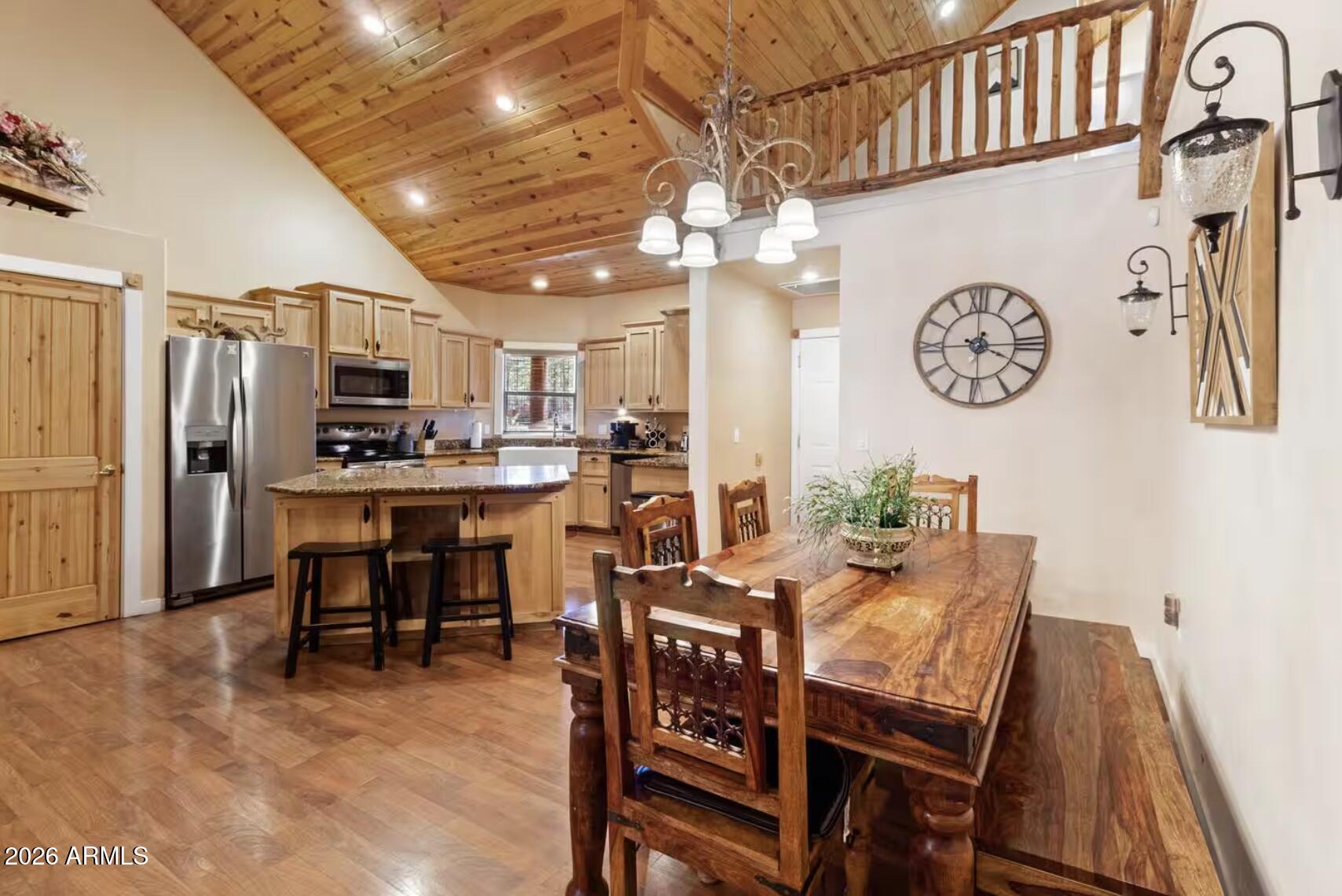 2540 Timber Ridge Lane Pinetop, AZ 85935 - Photo 10 of 37 a view of a dining area with furniture window and wooden floor