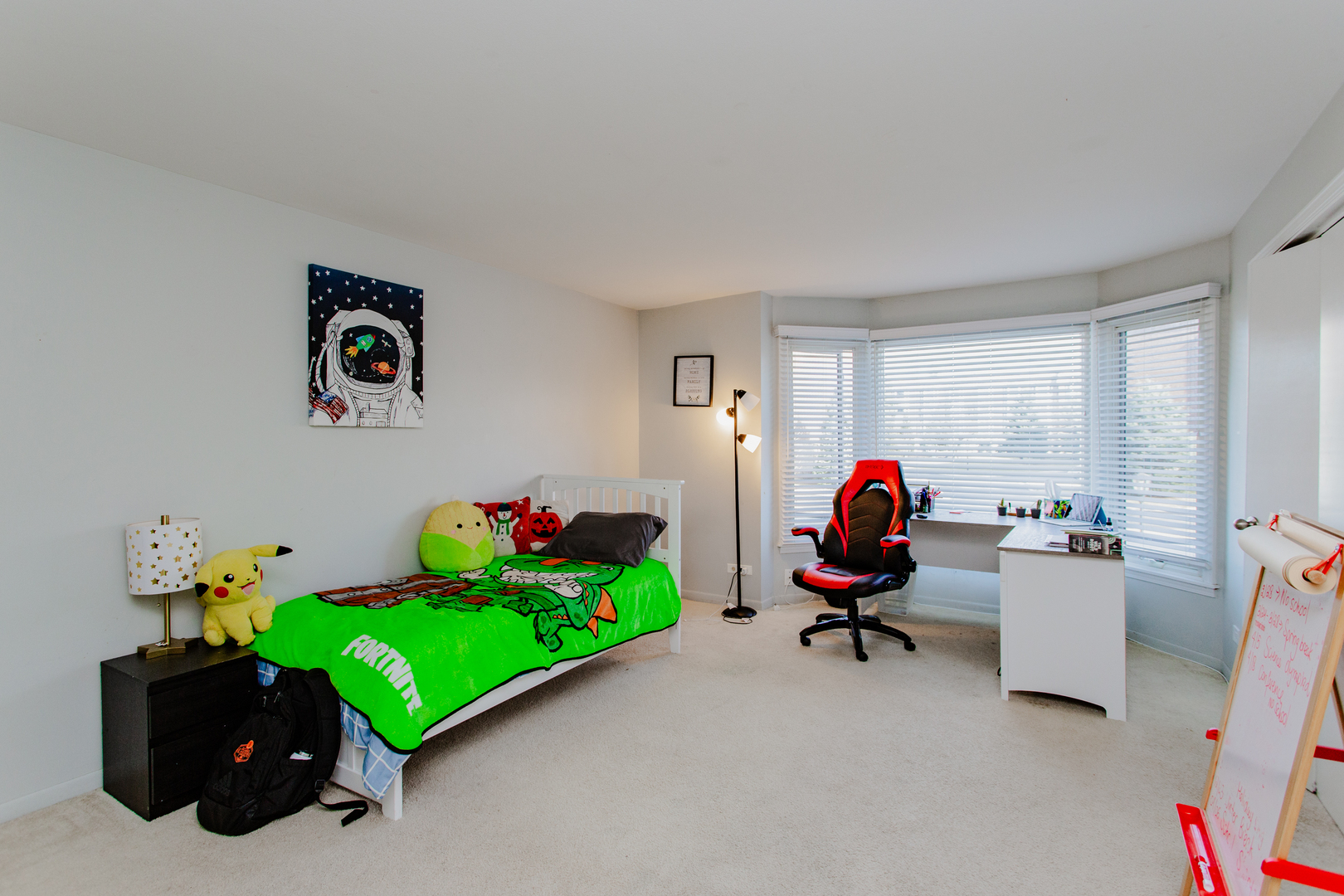 300 Thames Parkway, Unit 1C Park Ridge, IL 60068 - Photo 14 of 19 a room with toys and dresser