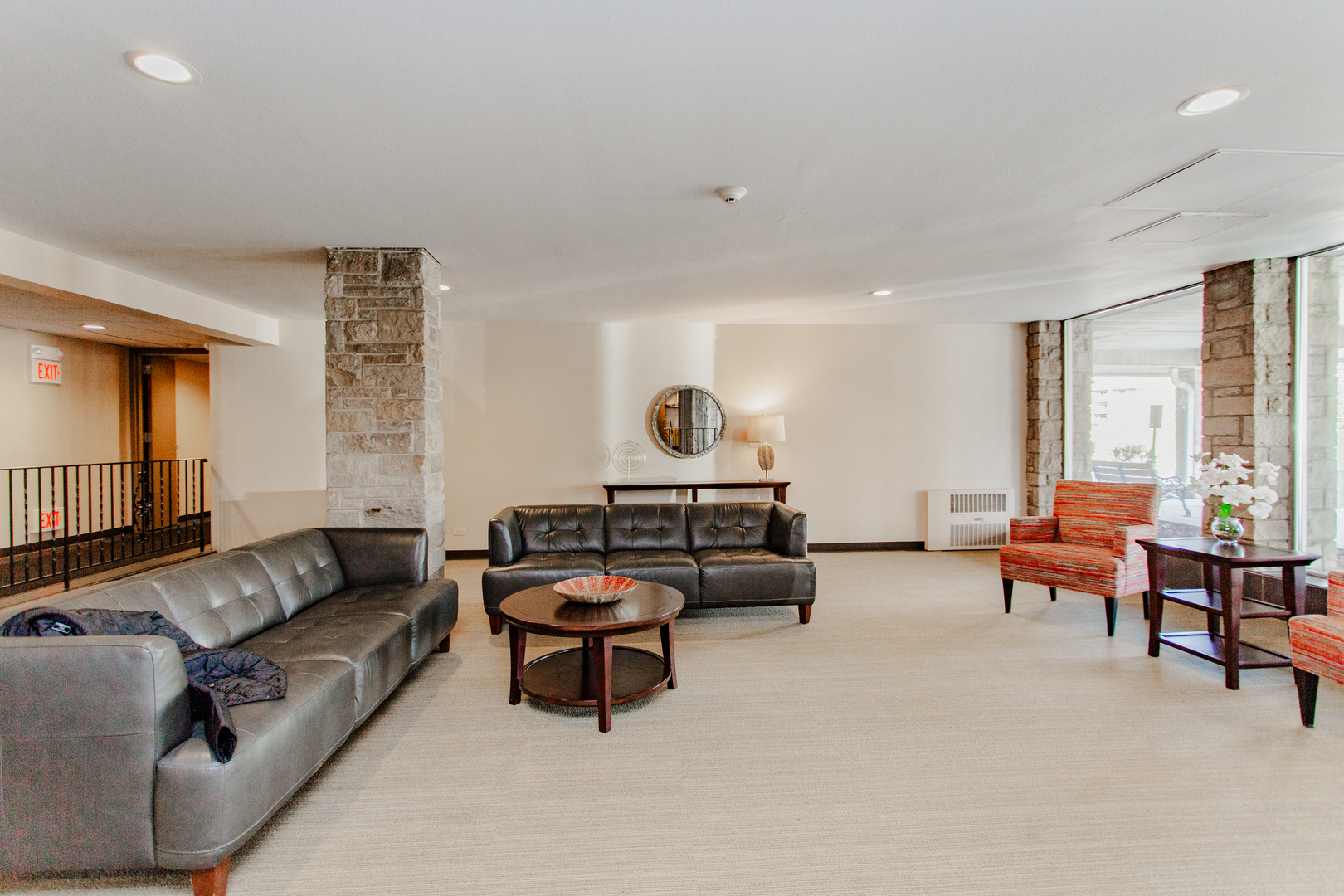 300 Thames Parkway, Unit 1C Park Ridge, IL 60068 - Photo 3 of 19 a living room with furniture and a large window