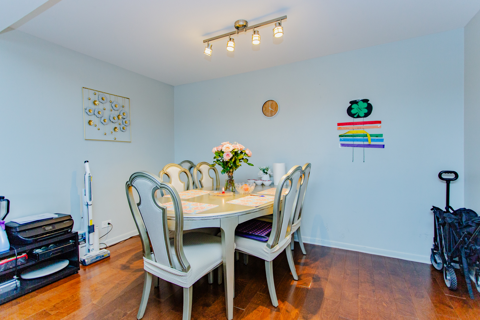 300 Thames Parkway, Unit 1C Park Ridge, IL 60068 - Photo 9 of 19 a view of a dining room with furniture and wooden floor