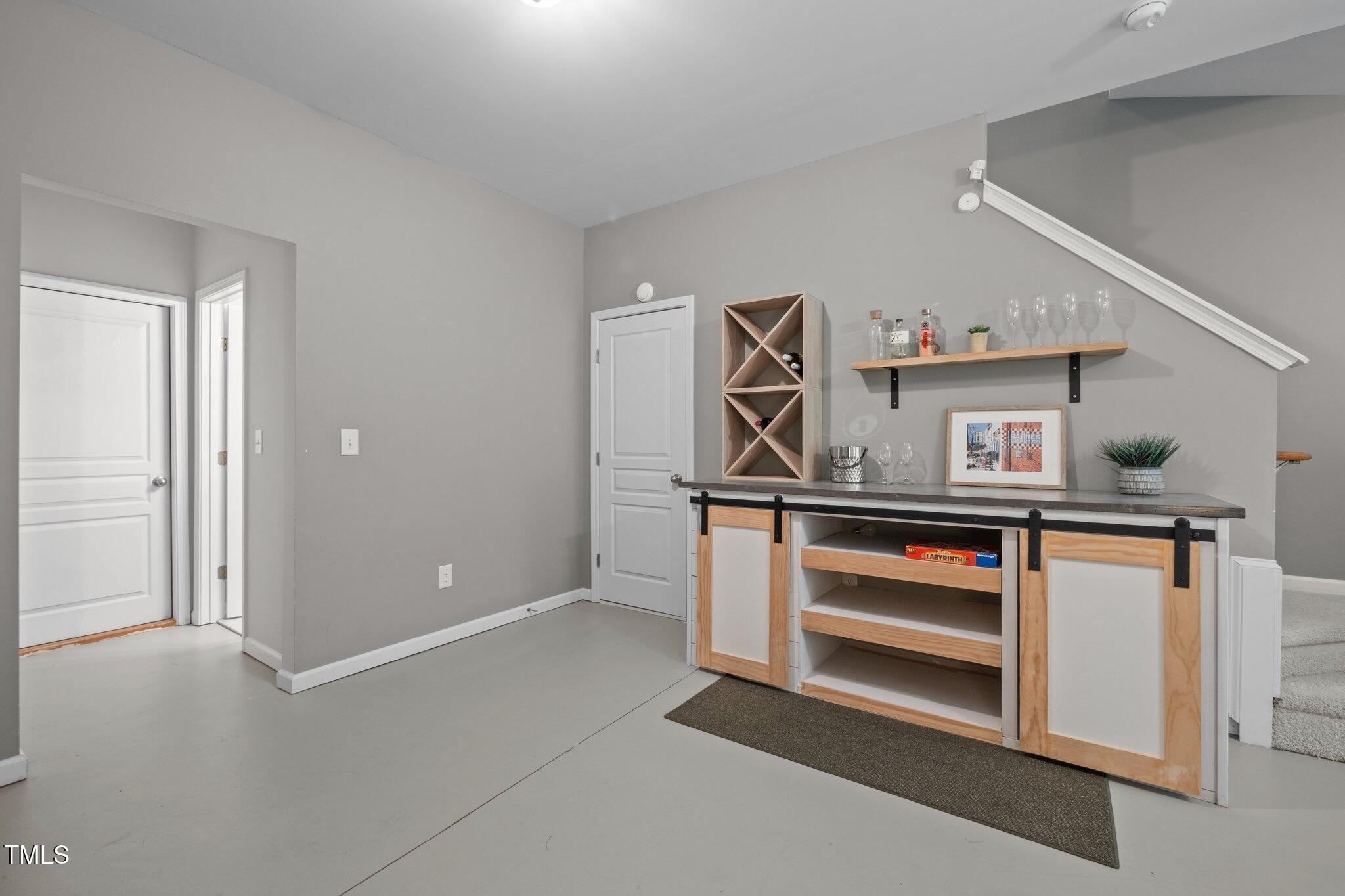 214 Cedar Elm Road Durham, NC 27713 - Photo 27 of 35 a kitchen with stainless steel appliances a stove and cabinets