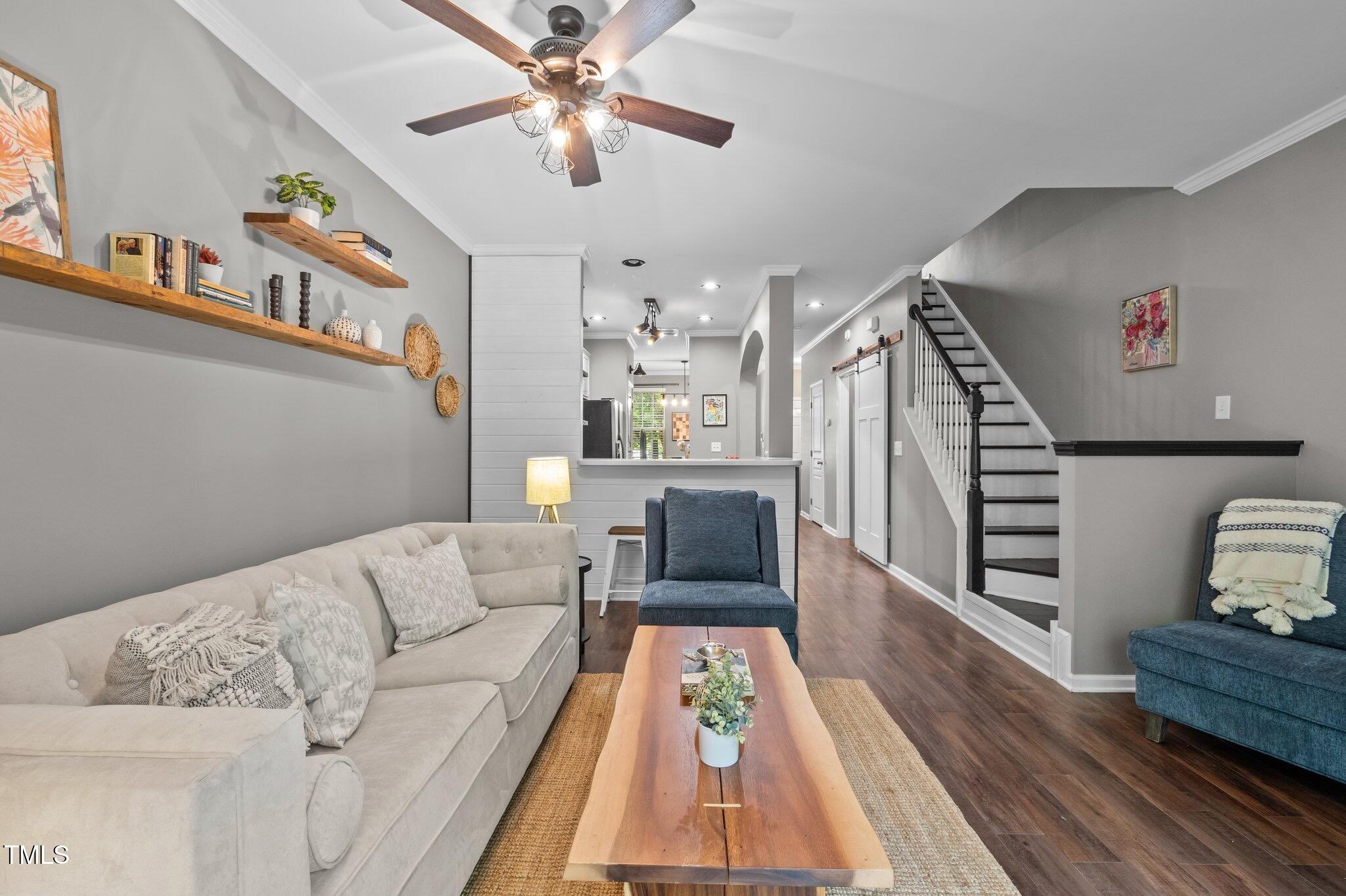 214 Cedar Elm Road Durham, NC 27713 - Photo 3 of 35 a living room with furniture and wooden floor