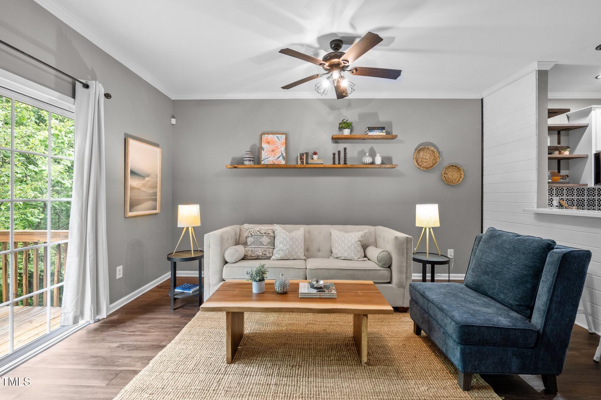 214 Cedar Elm Road Durham, NC 27713 - Photo 4 of 35 a living room with furniture and a window