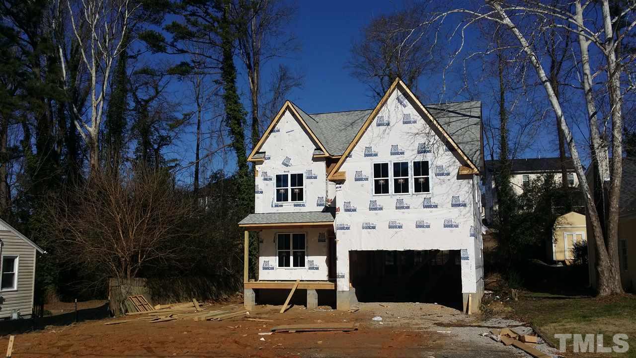 805 Edmund Street Raleigh, NC 27604 - Photo 1 of 13 a front view of a house with a yard