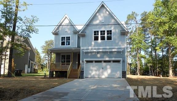 805 Edmund Street Raleigh, NC 27604 - Photo 2 of 13 a front view of a house with a yard