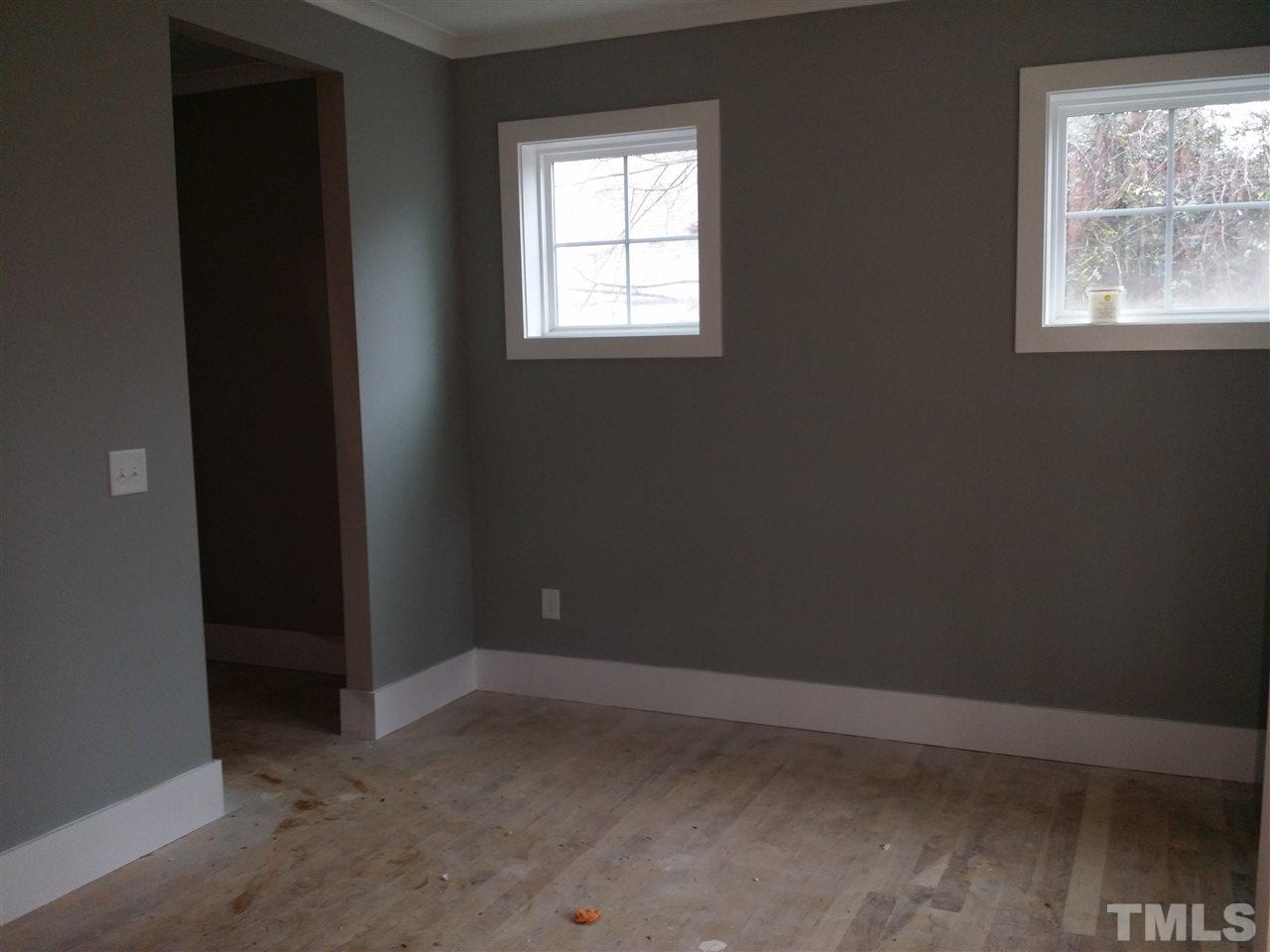 805 Edmund Street Raleigh, NC 27604 - Photo 3 of 13 an empty room with a window