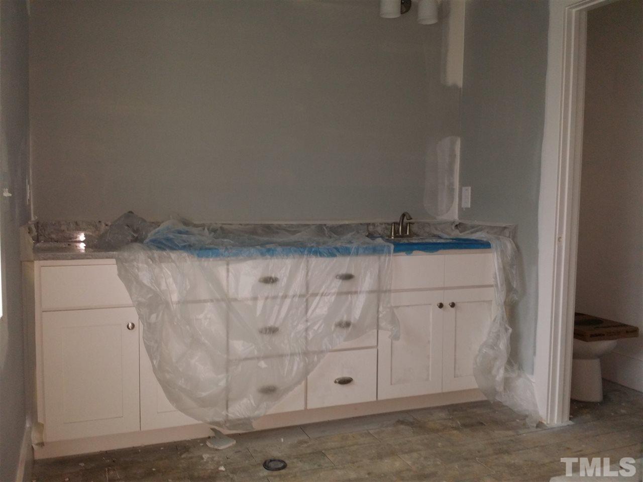 805 Edmund Street Raleigh, NC 27604 - Photo 7 of 13 a view of cabinets